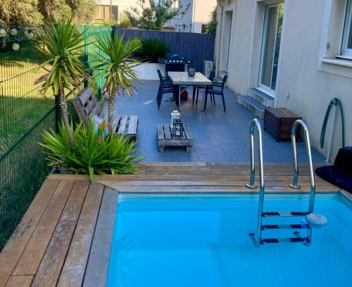 Photo de la galerie de l'établissement Villa avec piscine - Proche Montpellier Plages, à Saint-Jean-de-Védas