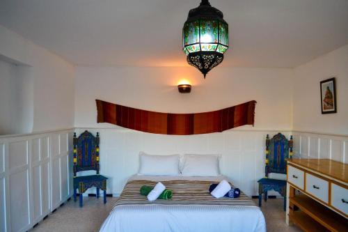 Ένα ή περισσότερα κρεβάτια σε δωμάτιο στο Ocean View 5 bed Villa Sauna