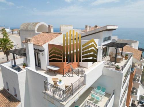 an aerial view of a building with the ocean at Exclusive Penthouse Privacy and Sea View in Vistamar KniTorroxCosta in Torrox Costa