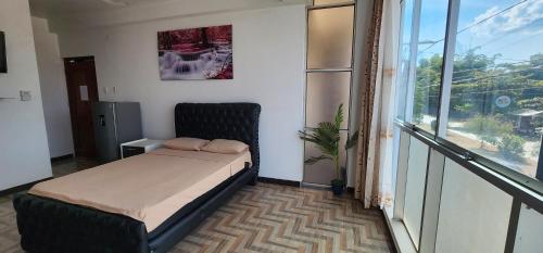 Кровать или кровати в номере Makasai Habitaciones
