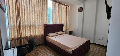 Кровать или кровати в номере Makasai Habitaciones