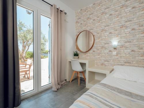 Postel nebo postele na pokoji v ubytování MARIAS PLACE IOS