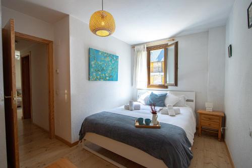 Postel nebo postele na pokoji v ubytování Apartamento familiar Canfranc Estación