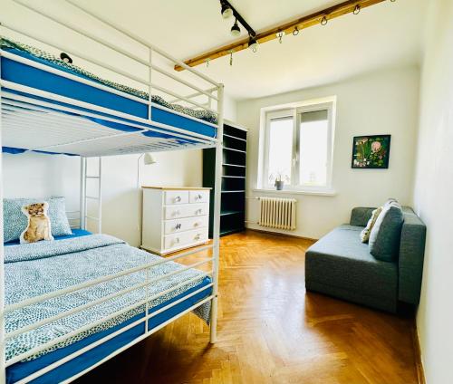 Posteľ alebo postele v izbe v ubytovaní Apartament z widokiem na Pałac i Kościół.