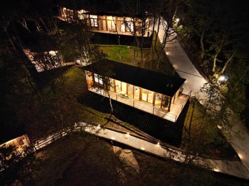 an overhead view of a house at night with lights at Casal Oseira in Ourense