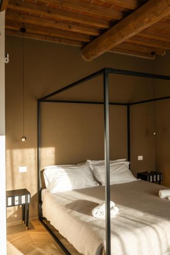 Postel nebo postele na pokoji v ubytování Podere Pietravento