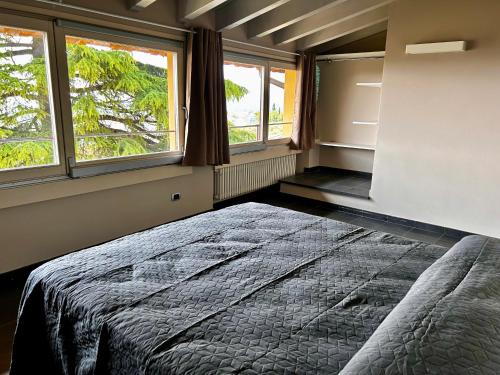 Ένα ή περισσότερα κρεβάτια σε δωμάτιο στο Appartamenti Picedo