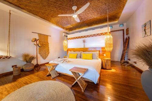Katil atau katil-katil dalam bilik di Yemaya Reefs, a Small Luxury Hotel