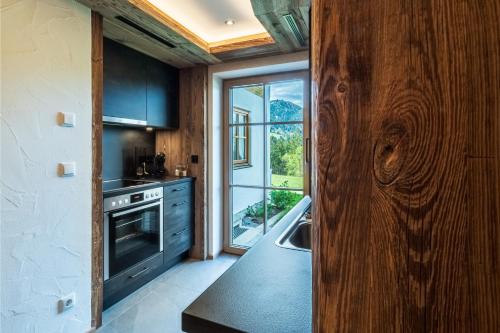 Kuchyň nebo kuchyňský kout v ubytování Appartements Hochödlehen
