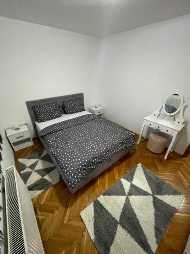 Ένα ή περισσότερα κρεβάτια σε δωμάτιο στο Apartman Deja vu