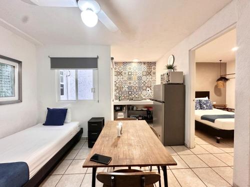 Una cama o camas en una habitación de Coco Suites by Andiani Travel