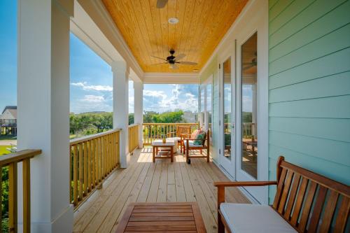 a front porch with a view of the mountains at All Sands On Deck in Oak Island
