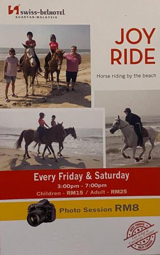 a group of people riding horses on the beach at Kuantan Imperium Residence Studio With Netflix by I-Home in Kuantan