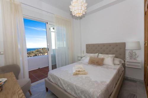 Letto o letti in una camera di Precioso adosado con jacuzzi en Marina del Este