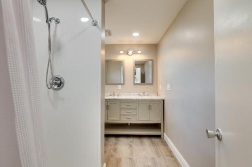 a bathroom with a shower and a sink at 16 Mi to Manatee Viewing! Spacious Tampa Retreat in Tampa
