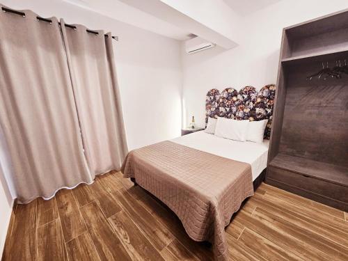 Sunrise Roomsにあるベッド