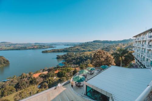 a view of the river from the balcony of a hotel at Itá Thermas Resort e Spa in Itá