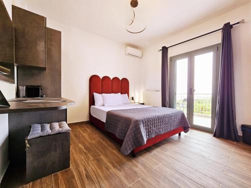 Postel nebo postele na pokoji v ubytování Sunrise Rooms