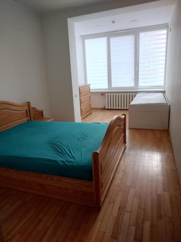 Ένα ή περισσότερα κρεβάτια σε δωμάτιο στο Ganyklu app