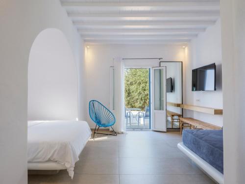 Postel nebo postele na pokoji v ubytování Jason Hotel