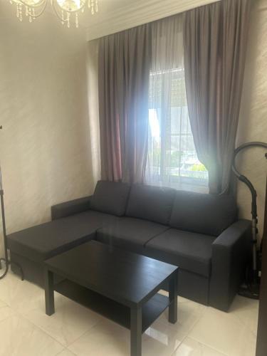 Posezení v ubytování Vasilev Apartment, Nea Kallikratia