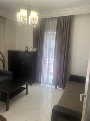 Posezení v ubytování Vasilev Apartment, Nea Kallikratia
