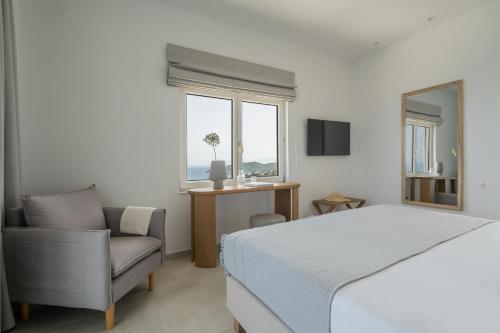 Postel nebo postele na pokoji v ubytování Oniro Skiathos