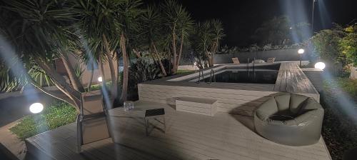 a visualization of a backyard with a swimming pool at Pool Seaside Relais - VILLE Ninfea, Marea, Rosa e Cassiopea in Fontane Bianche