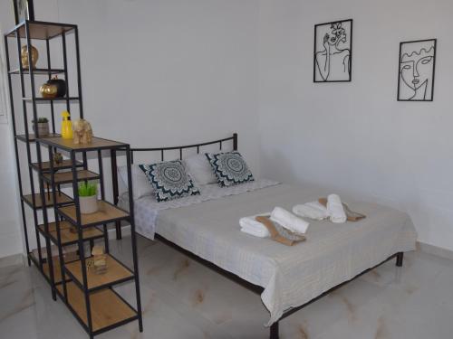 Postel nebo postele na pokoji v ubytování Gemini Apartment