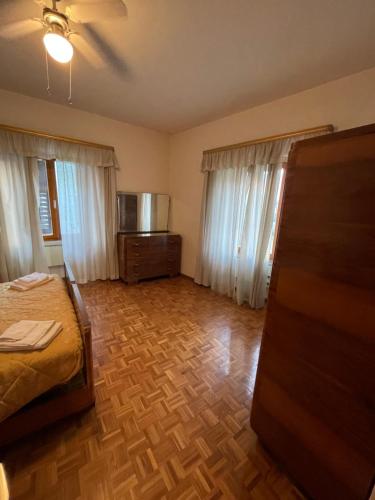 Postel nebo postele na pokoji v ubytování Casa vacanza predaia