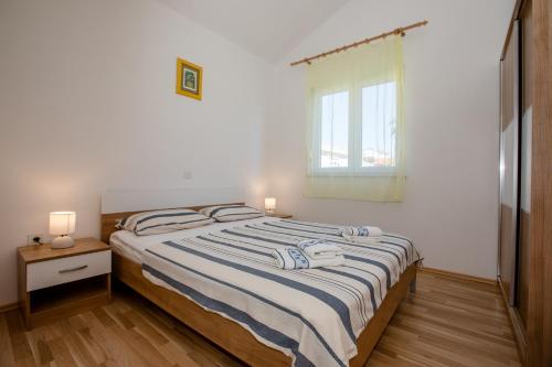 Krevet ili kreveti u jedinici u okviru objekta Apartments & Room Španjol