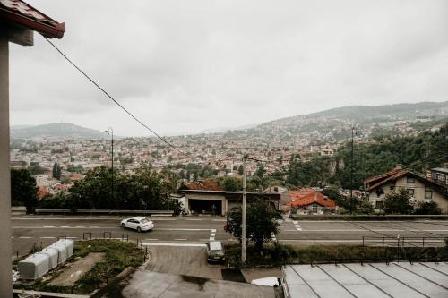 a view of a city from a parking lot at 3-Bedroom Residence - Prime Location with City View and Parking in Sarajevo