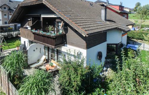 an aerial view of a house with a balcony at Ferienhaus - Mondsee in Mondsee