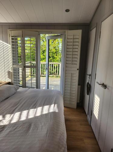 Postel nebo postele na pokoji v ubytování Creel Lodge