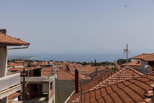 a view of a town with red roofs at Litochoro Olympus Studio in Litochoro