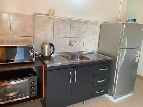 Køkken eller tekøkken på Departamento 2 Pellegrini