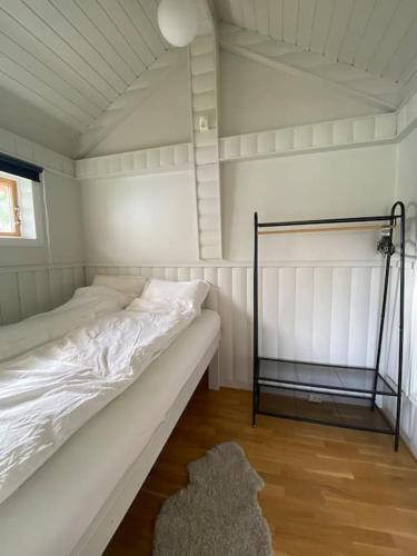 Katil atau katil-katil dalam bilik di The Little Red Cabin Lofoten
