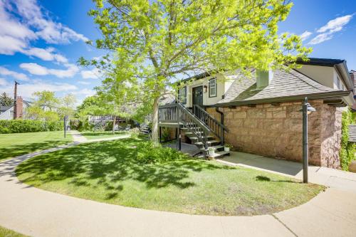 a house with a staircase and a stone wall at Helena Apartment with Patio Less Than 1 Mi to Downtown! in Helena