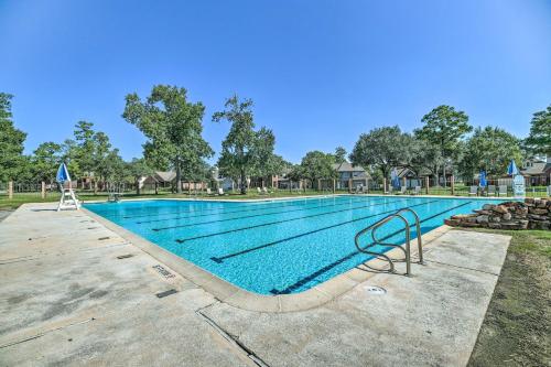 a swimming pool at a resort at Expansive Home in Humble Near Lake Houston! in Humble