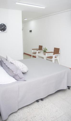 Кровать или кровати в номере Hotel Villa Park Real