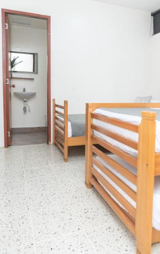 Телевизор и/или развлекательный центр в Hotel Villa Park Real