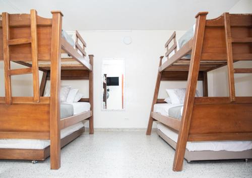 Кровать или кровати в номере Hotel Villa Park Real