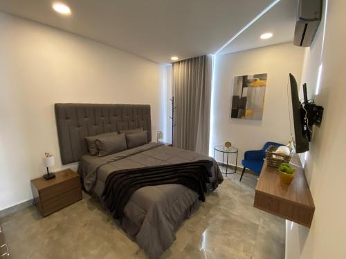 Ένα ή περισσότερα κρεβάτια σε δωμάτιο στο Departamento 4 Ríos