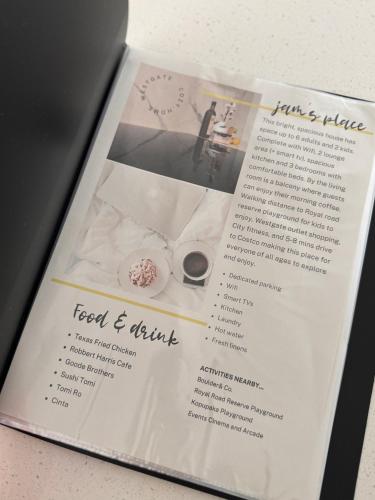 a page of a magazine with a picture of a doughnut at 3BR Auckland Holiday Home near Outlet shops and Costco in Auckland