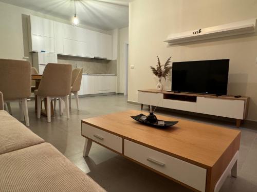 TV a/nebo společenská místnost v ubytování ODORE DI MARE APARTMENTs