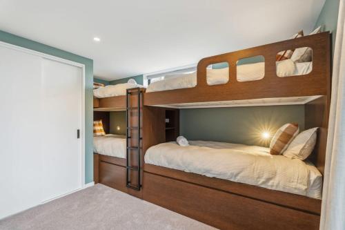 Ένα ή περισσότερα κρεβάτια σε δωμάτιο στο MacAndrew Luxury Lodge