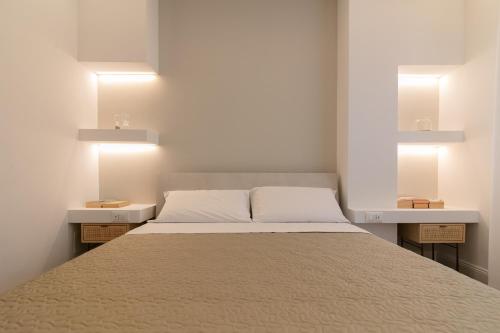 Postel nebo postele na pokoji v ubytování MT Apartments