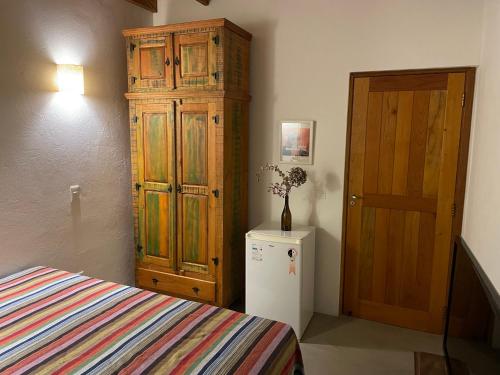Ένα ή περισσότερα κρεβάτια σε δωμάτιο στο Casa Mescla