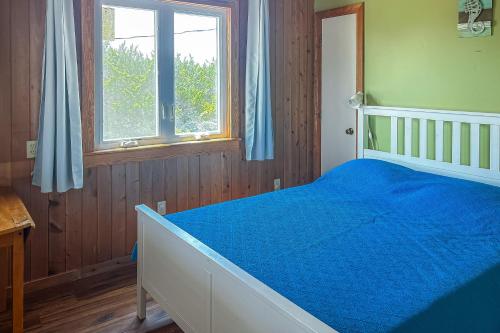 Postel nebo postele na pokoji v ubytování Sunset Sound Escape
