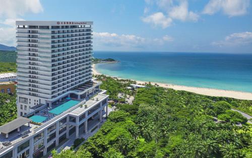 an aerial view of a hotel and the beach at Sanya Dadonghai Seaview Hotel in Sanya